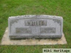 Joseph T White