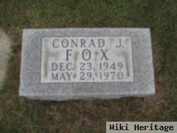 Conrad J Fox