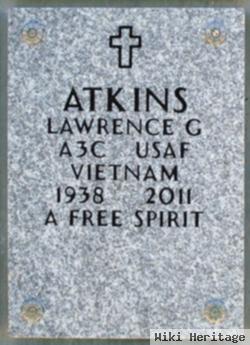 Lawrence G Atkins