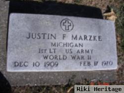 Justin F Marzke