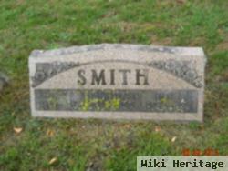 John F Smith