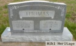 John A Thomas