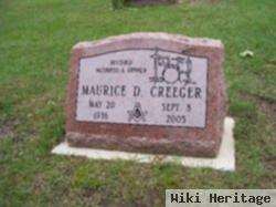 Maurice D Creeger