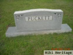 Dewitt T Puckett