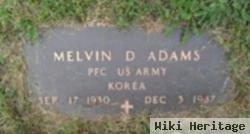 Melvin D Adams