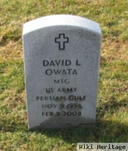 David L Owata