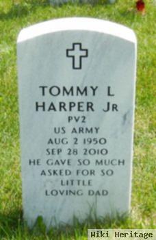 Tommy Lee "june / T" Harper, Jr
