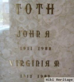 John A. Toth