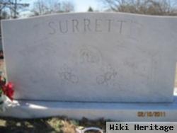 J Luther Surrett