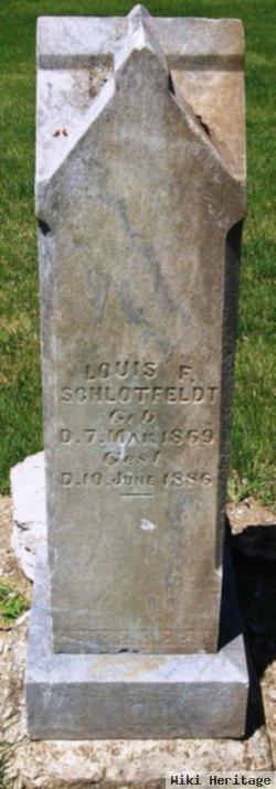 Louis F Schlotfeldt