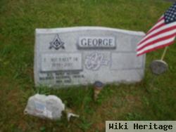 E. Michael George