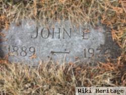 John E Helgeson