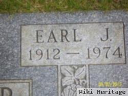 Earl J. Dexter