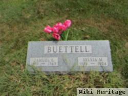 Samuel E Buettell