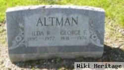 George E Altman