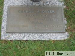 George M Dever