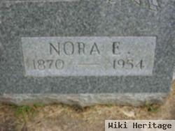 Nora E. Comley