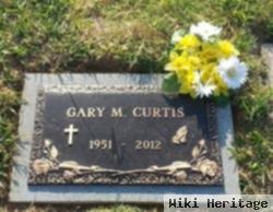 Gary M Curtis