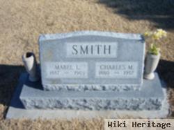 Charles M Smith