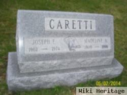 Joseph E Caretti