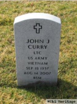 John J Curry