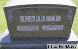 Robert E Garrett