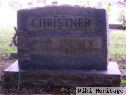 John W Christner