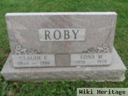 Claude E Roby