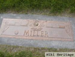 Paul E Miller