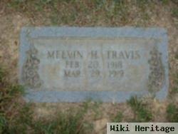 Melvin H Travis