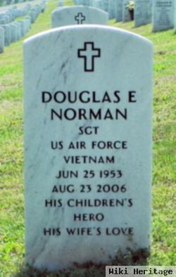 Douglas E Norman