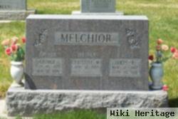 James B Melchior