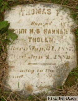 Thomas F Tholan