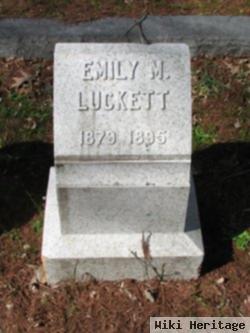 Emily M Luckett