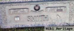 Frank E Smith