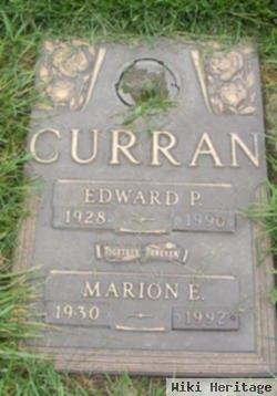 Marion E Curran