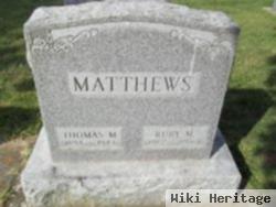 Thomas M Matthews