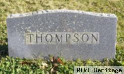 Kenneth E Thompson