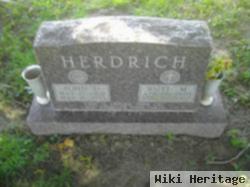 John D Herdrich