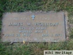 James M Holliday