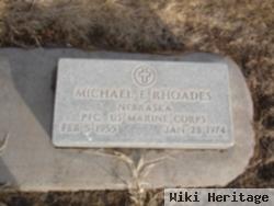 Michael E Rhoades