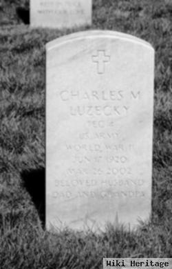 Charles M Luzecky