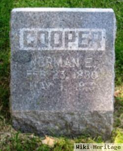 Norman E Cooper