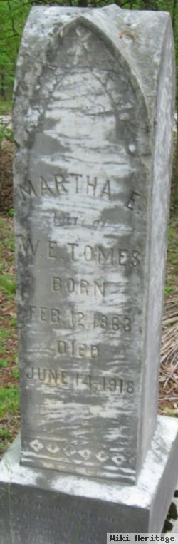 Martha E. Tomes