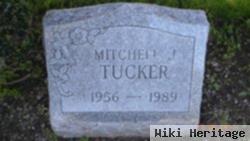 Mitchell J Tucker