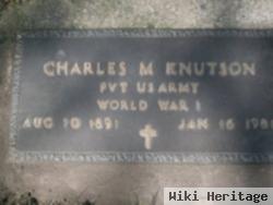 Charles M Knutson