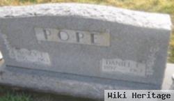 Daniel E Pope