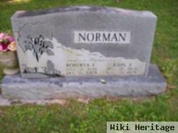 John E Norman