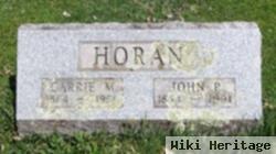 Carrie M Horan