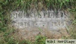 John T Peters